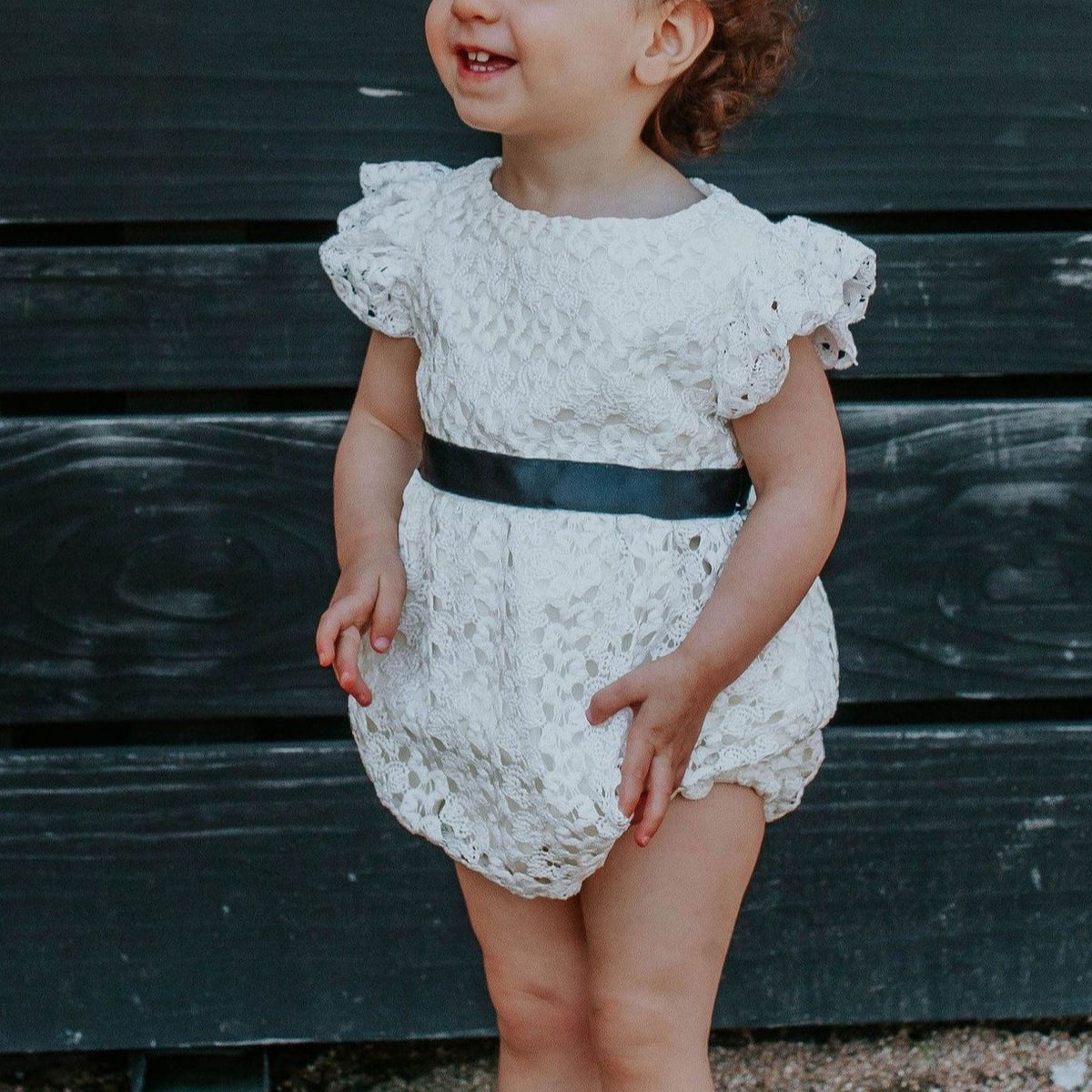 Infant Girl s White Lace Bubble Romper with Black Satin Sash