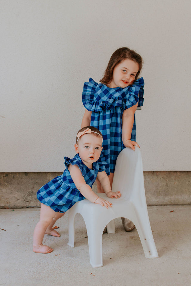 matching navy and blue ruffle dress and bubble romper