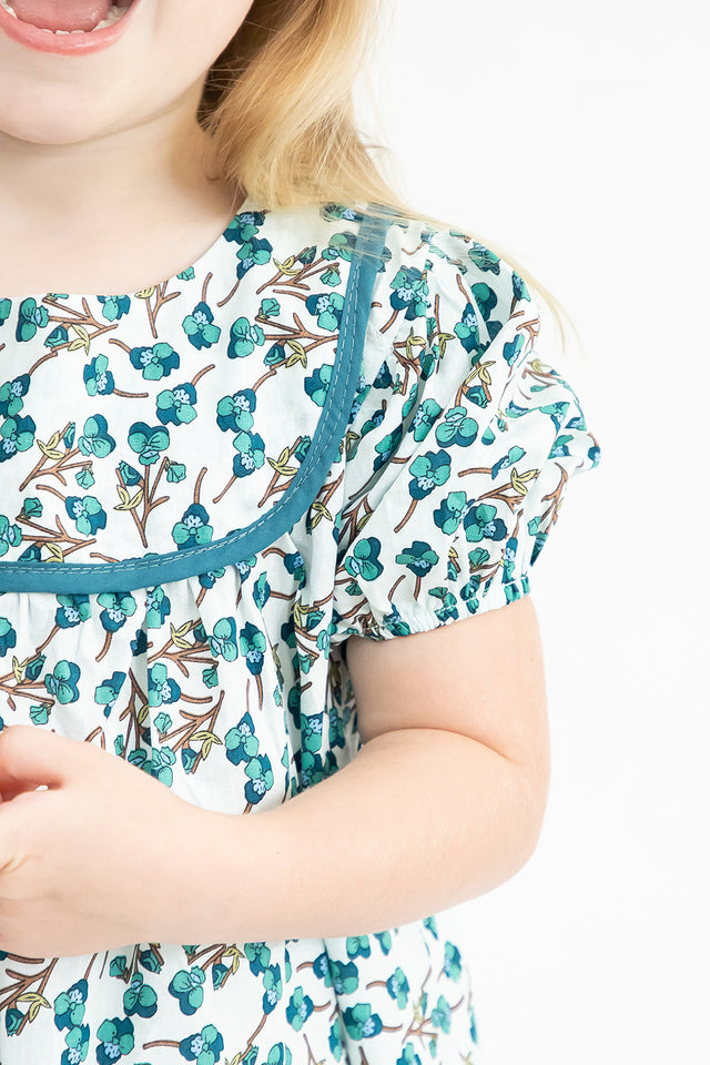 Girl’s Light Turquoise Puff Sleeve Floral Dress with Piping