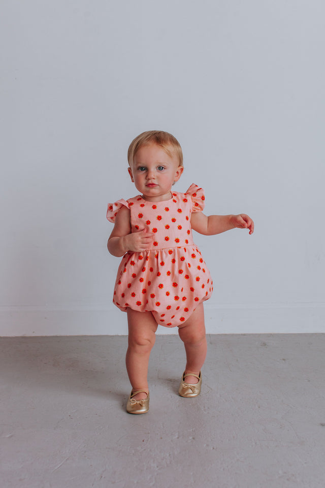 infant girl's orange floral bubble romper