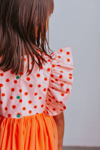 little girl's orange floral dress