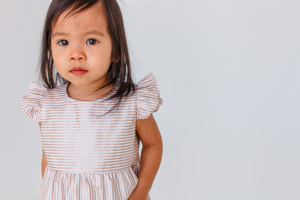 rose gold ruffle romper