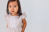 rose gold ruffle romper