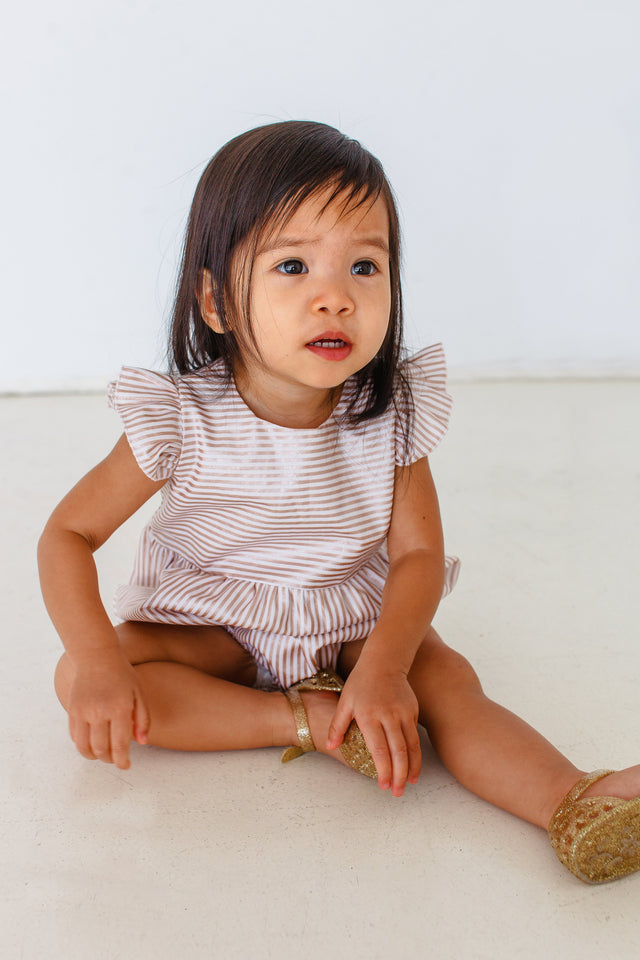 little girls rose gold romper