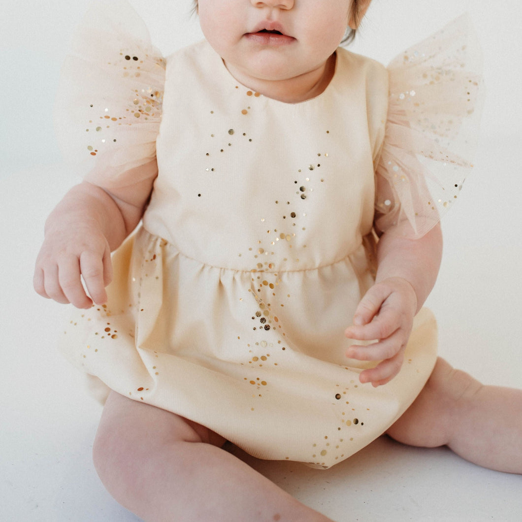 Infant Girl’s Ivory Tulle Sparkly Bubble Romper. We love this sparkly tulle bubble romper for a wedding, first birthday and any special occasion. 