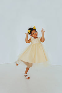 little girls yellow dress