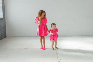 little girls matching pink polka dot outfits