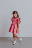 little girl's pink and white raindrop dress