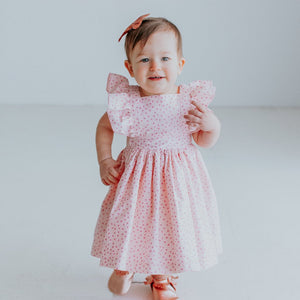 Little Girl's Open Back Pink Pinafore Dress with Sparkly Magenta Polka Dots