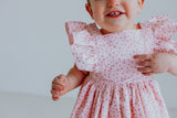 Little Girl's Open Back Pink Pinafore Dress with Sparkly Magenta Polka Dots