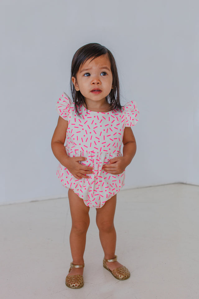 pink confetti romper