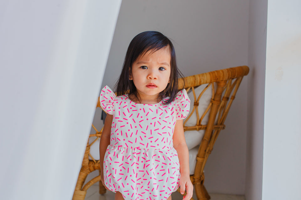 pink confetti bubble romper for baby