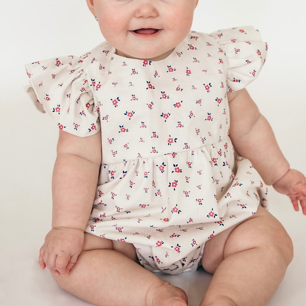 little girls white and red ditsy floral bubble romper