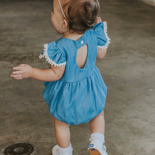 Infant Girl's Denim Chambray Romper with Pom Pom Trim