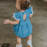 Infant Girl's Denim Chambray Romper with Pom Pom Trim