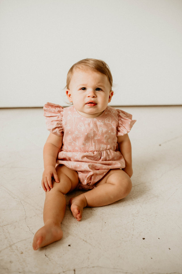 baby girls blush pink floral bubble romper