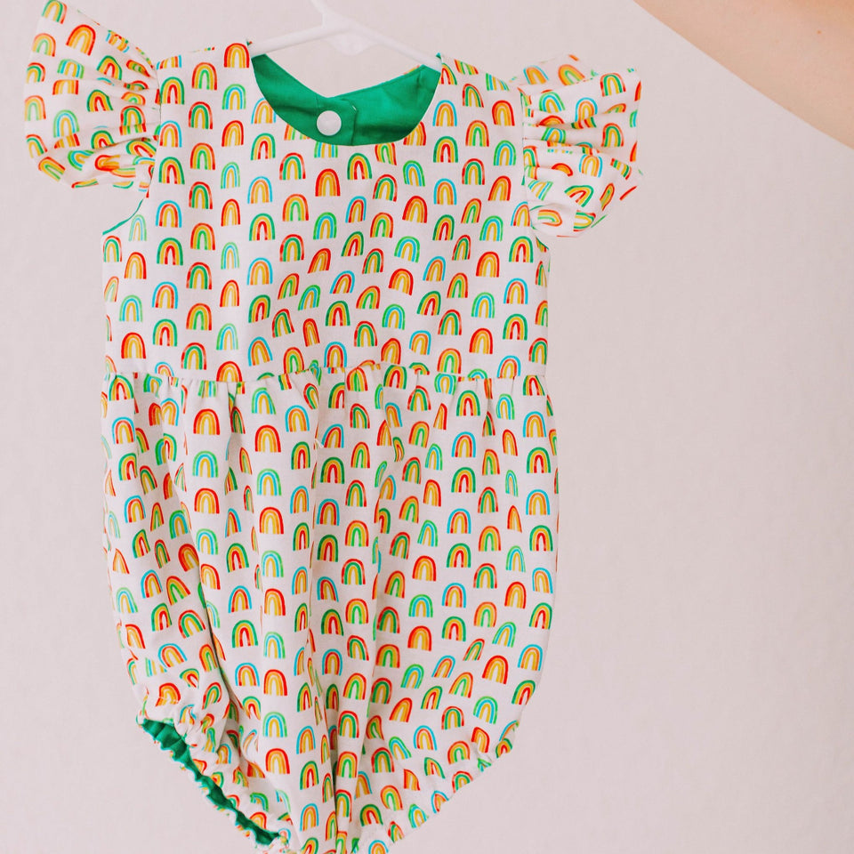 green and multicolor rainbow bubble romper