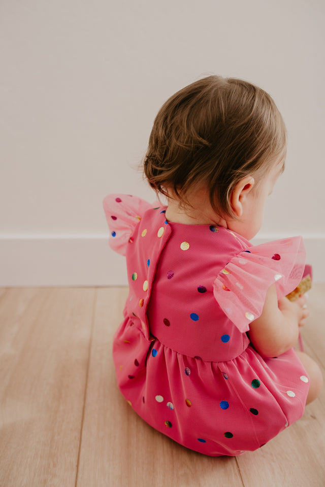 pink polka dot tulle romper