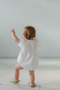 baby girl's white first birthday outfit