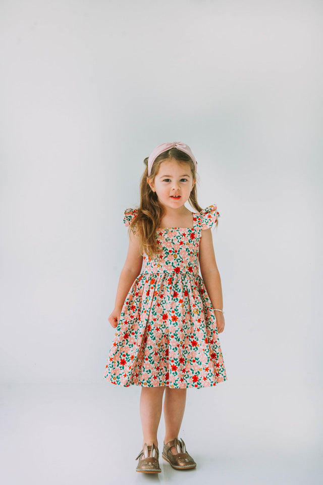 little girls pink red and gold floral twirl dress with flutter sleeves