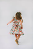 little girls pink red and gold floral twirl dress with flutter sleeves