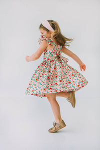 little girls pink red and gold floral twirl dress with flutter sleeves