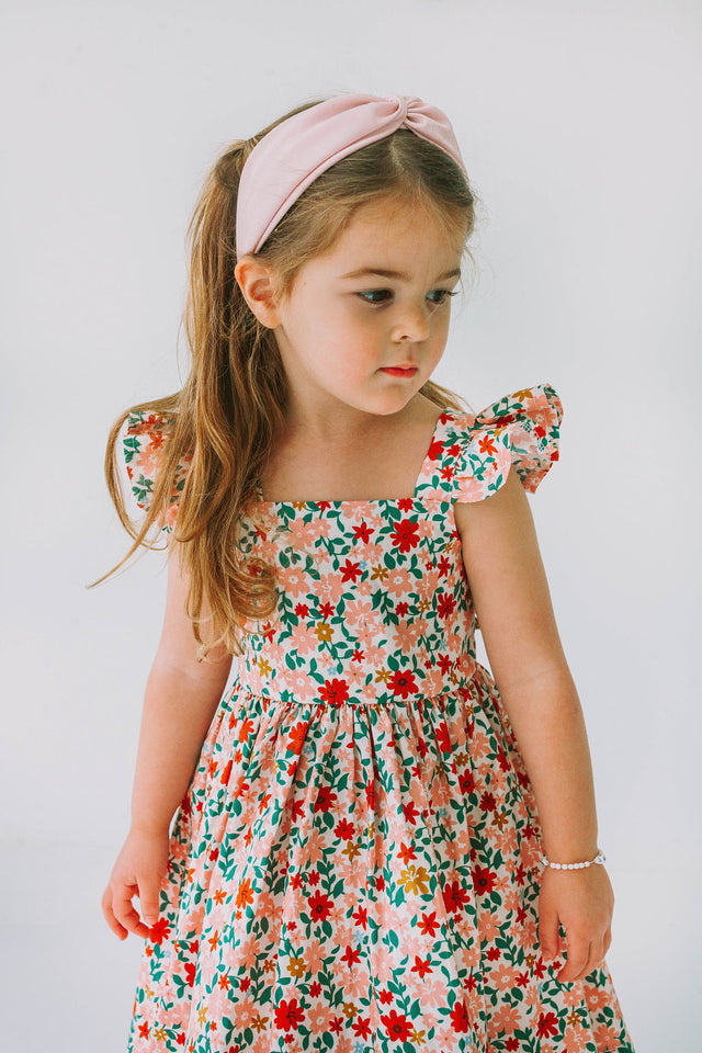 little girls pink red and gold floral twirl dress with flutter sleeves
