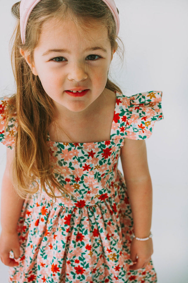 little girls pink red and gold floral twirl dress with flutter sleeves