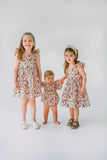 matching floral dresses and rompers for sisters