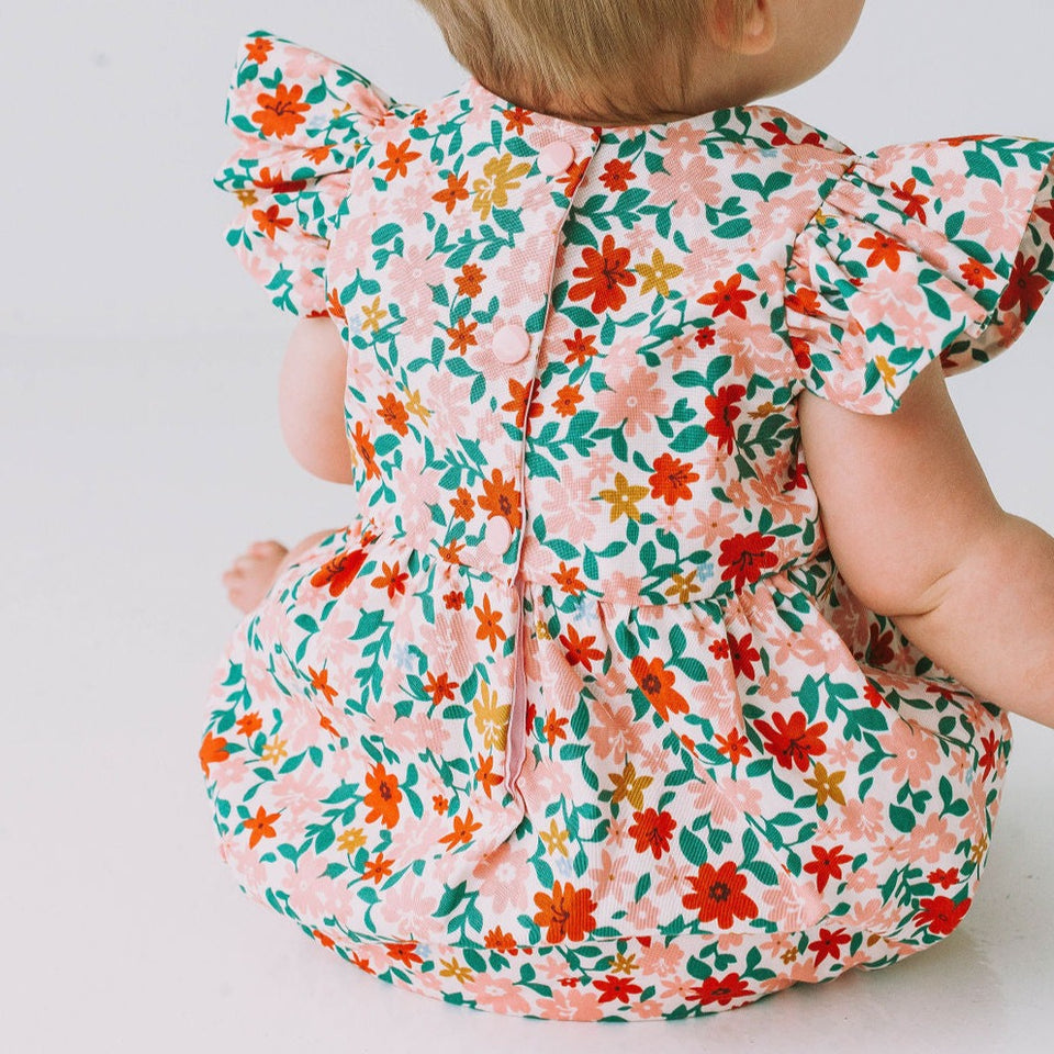 infant girls pink red and gold floral bubble romper