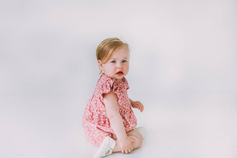 mauve and white ditsy floral print romper