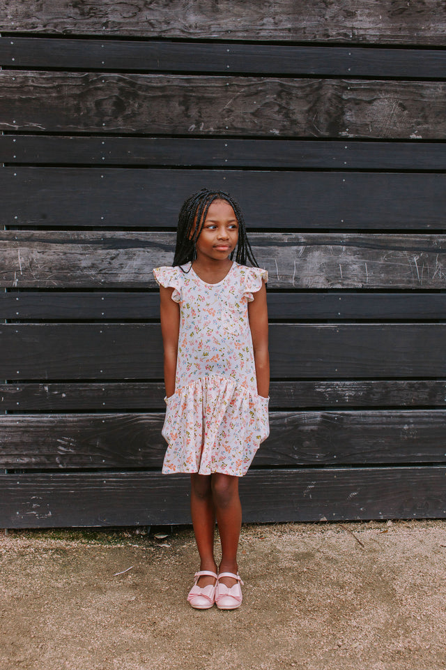 Little Girl's Ivory Floral Jersey Three Pocket Dress