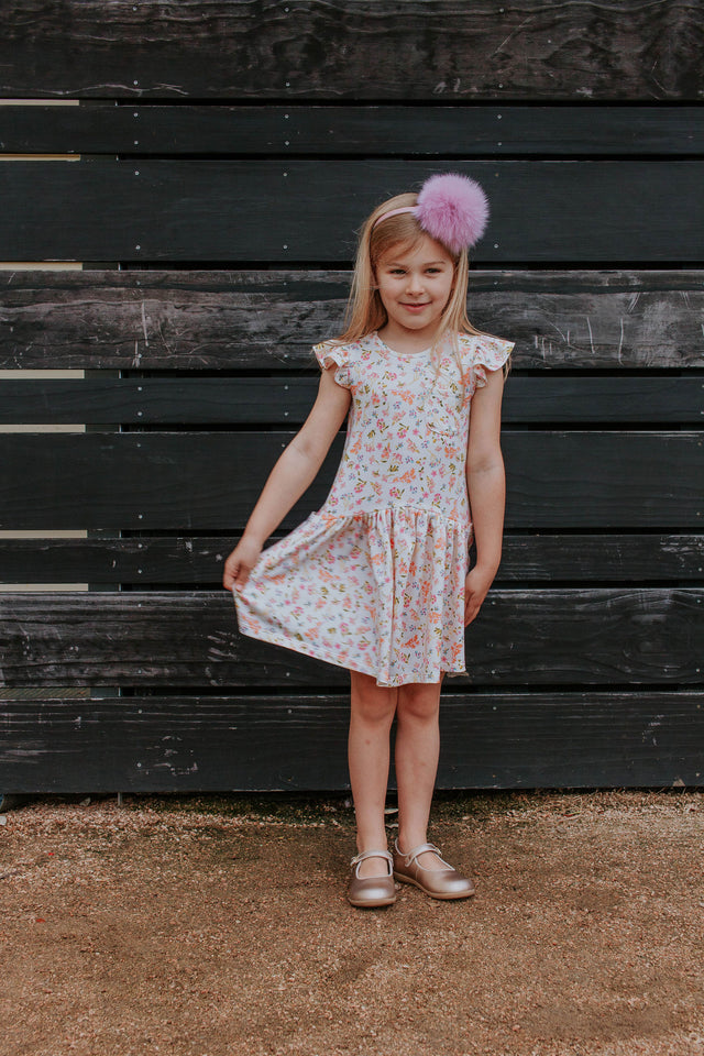 Little Girl's Ivory Floral Jersey Three Pocket Dress