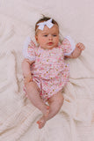 Infant Girl's Pink and White Calico Floral Ruffle Cotton Bubble Romper with Venice Lace Trim