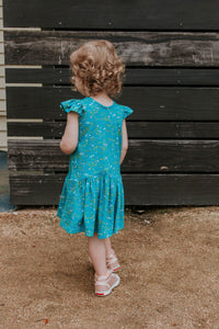 Little Girl's Turquoise Floral Jersey Three Pocket Dress