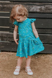 Little Girl's Turquoise Floral Jersey Three Pocket Dress
