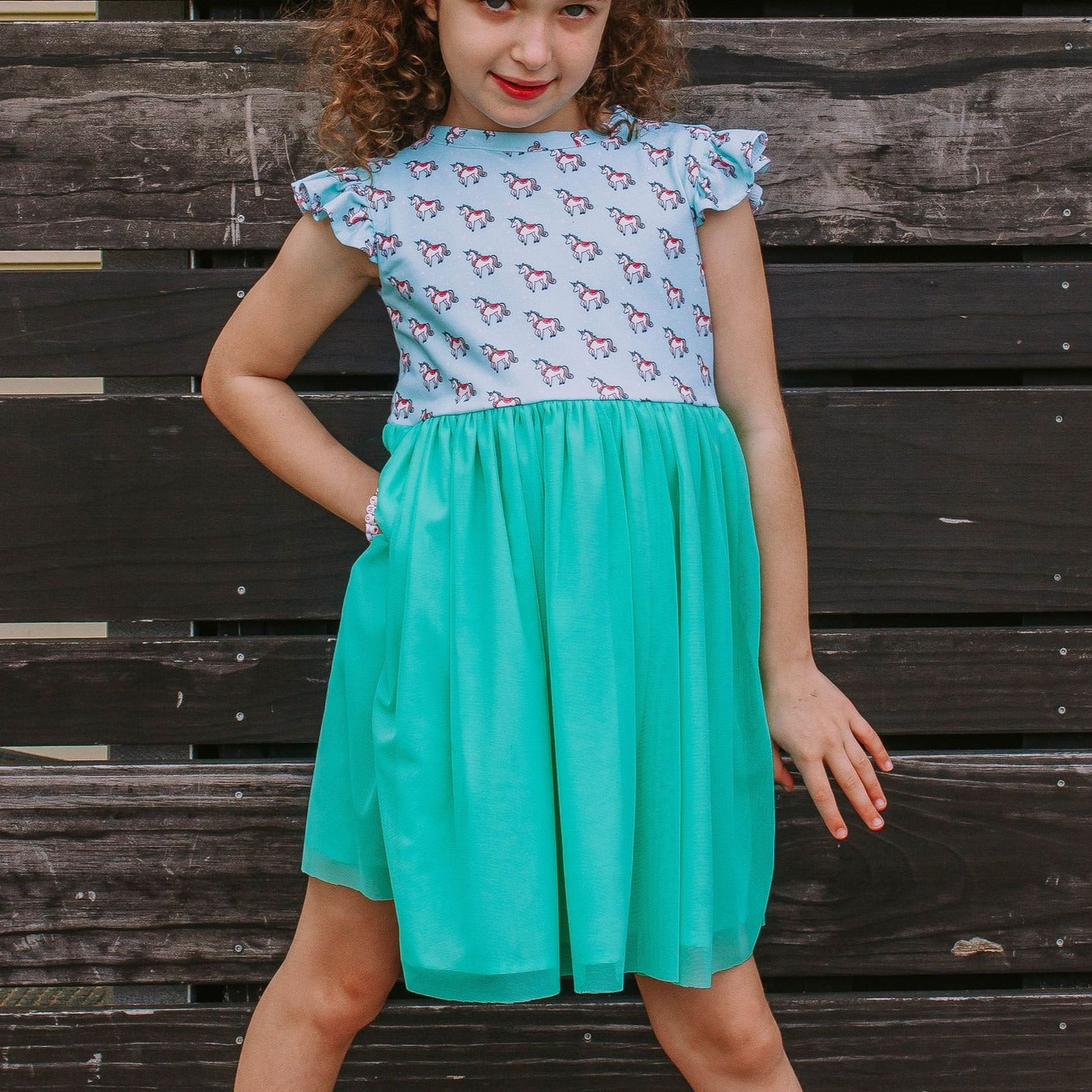 Little Girl's Turquoise Unicorn Print Ruffle Jersey Dress