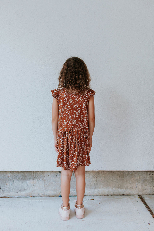 Little Girl's Brown and White Floral Jersey Cotton Three Pocket Dress