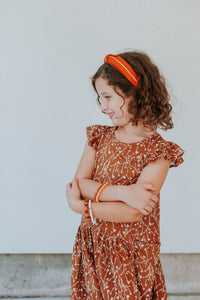 Little Girl's Brown and White Floral Jersey Cotton Three Pocket Dress