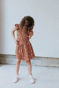 Little Girl's Brown and White Floral Jersey Cotton Three Pocket Dress
