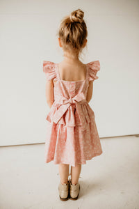girls pink and white floral twirl dress with peplum skirt