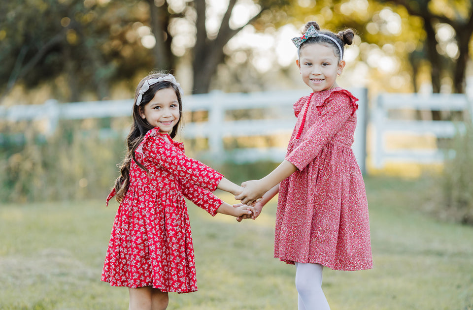 Little Girl's Red and White Ditsy Floral Christmas Dress with Red Trim