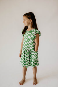 girls green and white dress with pockets