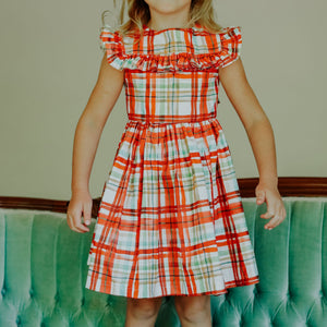 Little Girl's Bright Red and Green Christmas Tartan Ruffle Bib Dress