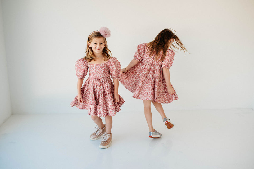 little girls pink and white puff sleeve dress