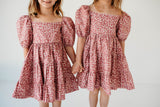 little girls pink and white puff sleeve dress