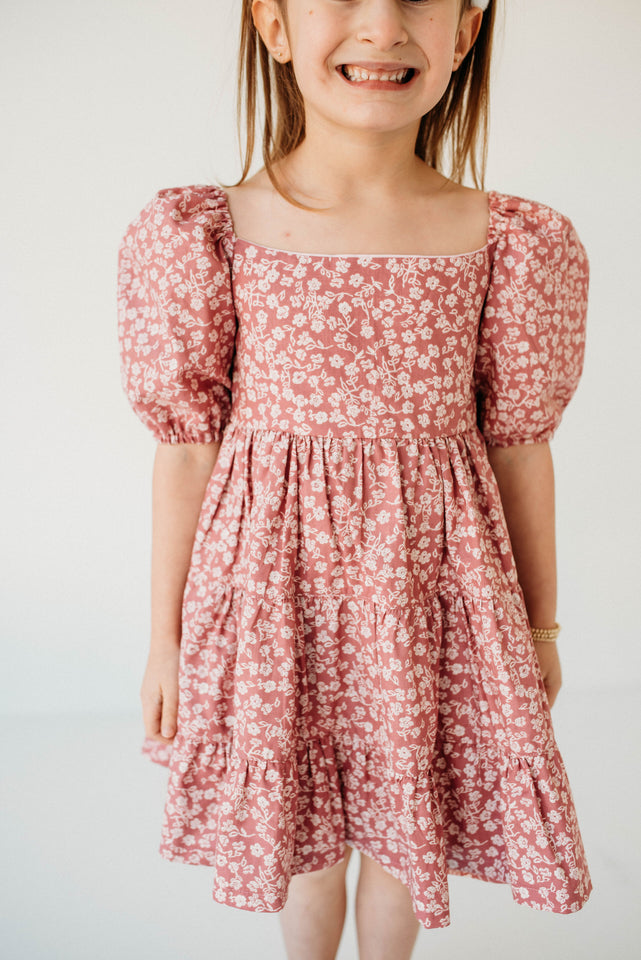 little girls pink and white puff sleeve dress