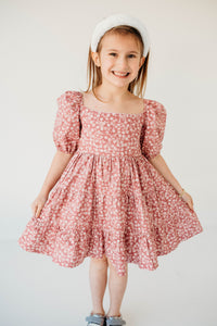 little girls pink and white puff sleeve twirl dress