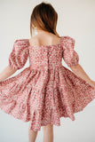 little girls pink and white puff sleeve dress