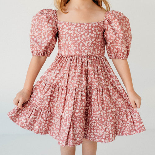 little girls pink and white puff sleeve dress